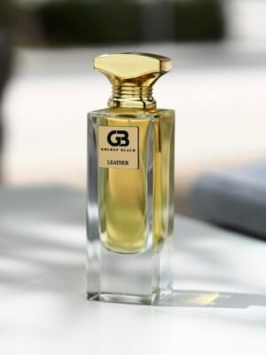 Luxurious perfume bottle in selective focus with natural light and shadows highlighting its design.