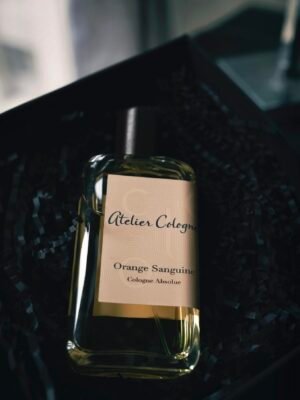 Stylish Atelier Cologne Orange Sanguine bottle elegantly placed in a gift box, perfect for luxury product showcases.